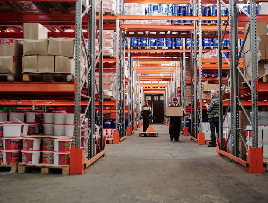 Warehouse aisle stacked with palletised distribution stock